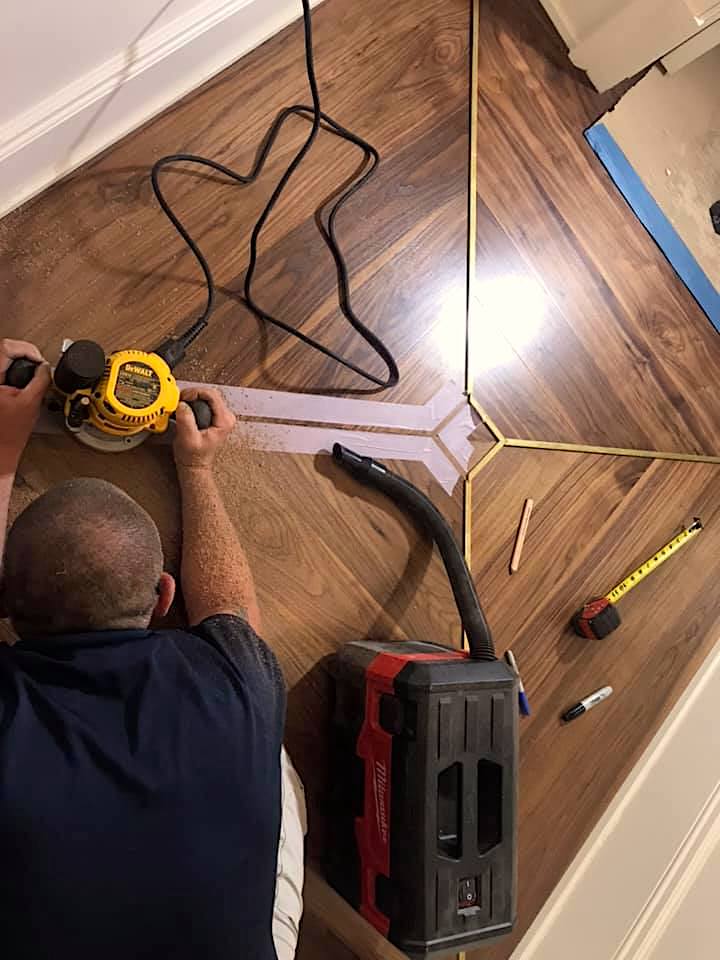 carving into wood flooring