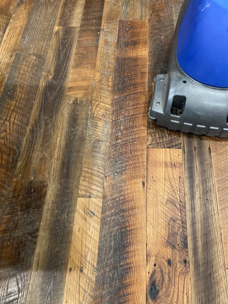 hardwood floor being scrubbed